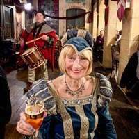 Troubadour and minstrel atmosphere at a medieval dinner.