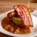 Stoemp with sausage & bacon confit